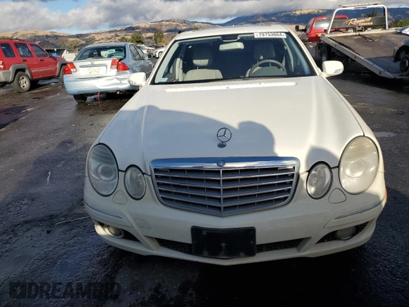 2007 Mercedes-Benz E 550 with VIN WDBUF90X77X212587, listed as a Copart auction lot 79753664 with 111,768 mi miles and Salvage Title. Bid and sale history available at carsss.com. Image 5.