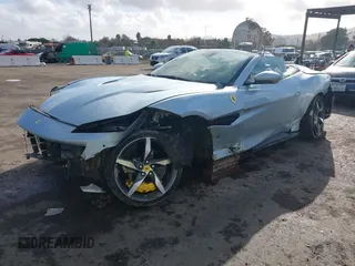 2022 Ferrari Portofino z VIN ZFF02RPA0N0278807, wystawiony jako IAAI lot #41012890 z przebiegiem 5325 mil mil oraz . Historia ofert i sprzedaży dostępna na DreamBid. Obrazek 2.