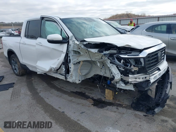 2023 Honda Ridgeline RTL with VIN 5FPYK3F55PB018188, listed as a IAAI auction lot 41952319 with 73,019 mi miles and . Bid and sale history available at DreamBid. Image 1.