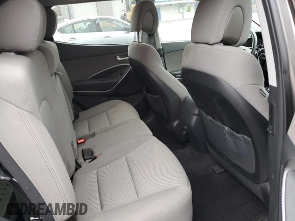 2017 Hyundai Santa Fe 2.4L z VIN 5NMZTDLB1HH036584, wystawiony jako Copart lot #56033815 z przebiegiem 56 003 mil mil oraz Szkoda całkowita • Salvage title. Historia ofert i sprzedaży dostępna na DreamBid. Obrazek 11.