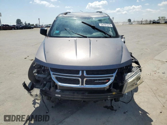 2013 Dodge Journey SE с VIN 3C4PDCAB9DT656887, выставлен на аукционе Copart как лот 54791315 с пробегом 130 394 миль миль и Списание • Salvage title. История ставок и продаж доступна на DreamBid. Изображение 5.