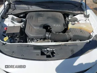 2021 Dodge Charger SXT with VIN 2C3CDXBG5MH605867, listed as a IAAI auction lot 41682336 with 56,660 mi miles and . Bid and sale history available at DreamBid. Image 10.