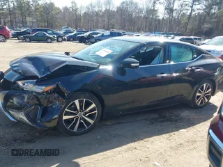 2021 Nissan Maxima SV with VIN 1N4AA6CV1MC513733, listed as a IAAI auction lot 41804923 with 75,570 mi miles and . Bid and sale history available at DreamBid. Image 14.