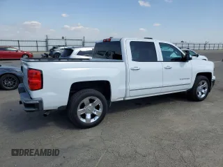 2014 Chevrolet Silverado 1500 LTZ with VIN 3GCPCSEJ3EG327241, listed as a Copart auction lot 52722815 with 174,843 mi miles and Salvage Title. Bid and sale history available at DreamBid. Image 3.