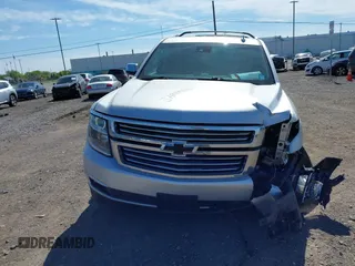 2016 Chevrolet Tahoe LTZ with VIN 1GNSKCKC1GR452600, listed as a IAAI auction lot 42305719 with 121,041 mi miles and . Bid and sale history available at DreamBid. Image 12.