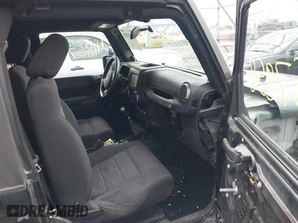 2011 Jeep Wrangler Sport with VIN 1J4AA2D18BL588273, listed as a IAAI auction lot 41857858 with 136,473 mi miles and . Bid and sale history available at carsss.com. Image 5.