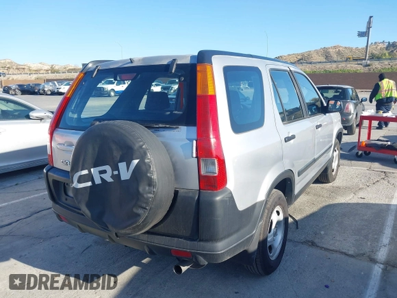 2003 Honda CR-V LX z VIN JHLRD684X3C009798, wystawiony jako IAAI lot #41957620 z przebiegiem 217 240 mil mil oraz . Historia ofert i sprzedaży dostępna na DreamBid. Obrazek 4.