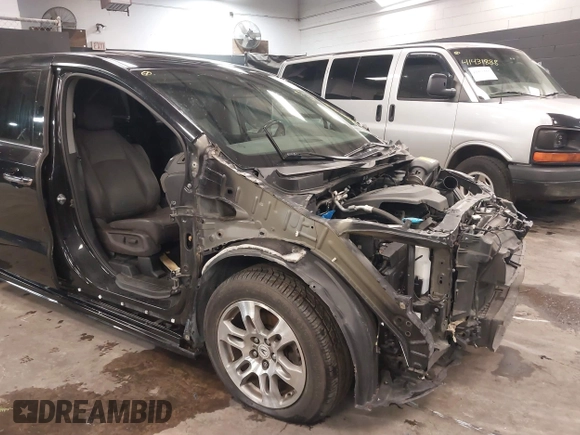 2018 Honda Odyssey Elite with VIN 5FNRL6H92JB110572, listed as a IAAI auction lot 41387270 with 159,806 mi miles and . Bid and sale history available at DreamBid. Image 6.