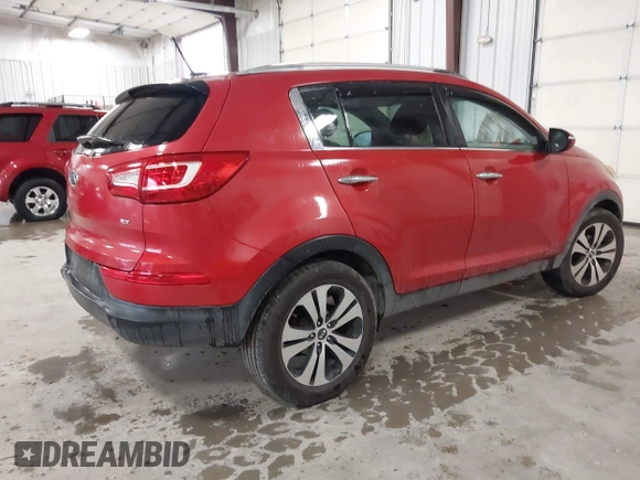 2011 Kia Sportage EX with VIN KNDPC3A29B7013959, listed as a IAAI auction lot 42196494 with 103,850 mi miles and . Bid and sale history available at carsss.com. Image 4.