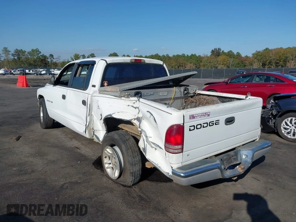 2001 Dodge Dakota Sport with VIN 1B7GL2AN81S127838, listed as a IAAI auction lot 40687174 with 235,301 mi miles. Bid and sale history available at carsss.com. Image 3.