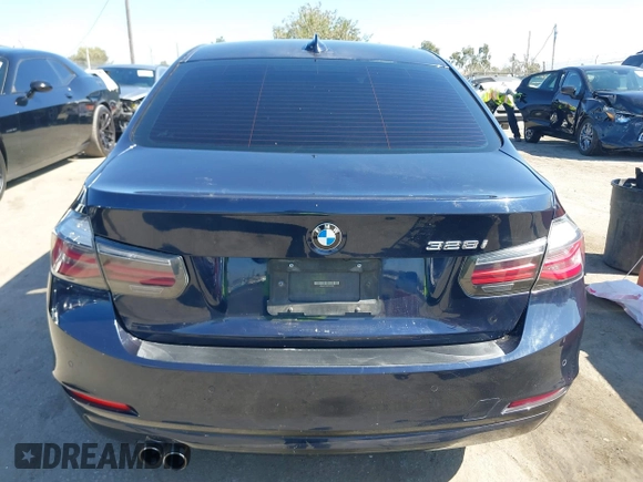 2015 BMW 3 Series 328i with VIN WBA3C1C50FK124300, listed as a IAAI auction lot 40112372 with 142,591 mi miles and . Bid and sale history available at carsss.com. Image 16.