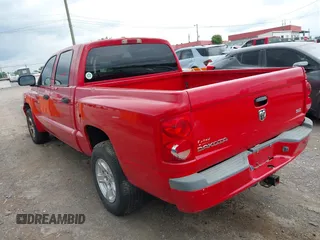 2007 Dodge Dakota SLT with VIN 1D7HE48K17S103188, listed as a IAAI auction lot 42187066 with 113,061 mi miles and . Bid and sale history available at carsss.com. Image 3.