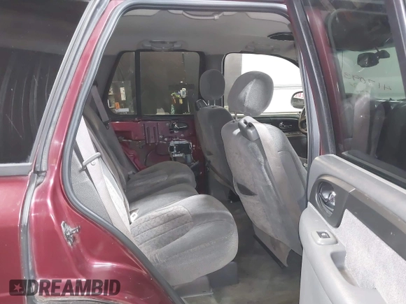 2002 GMC Envoy SLT with VIN 1GKDT13SX22426320, listed as a IAAI auction lot 41709359 with 104,418 mi miles. Bid and sale history available at carsss.com. Image 8.