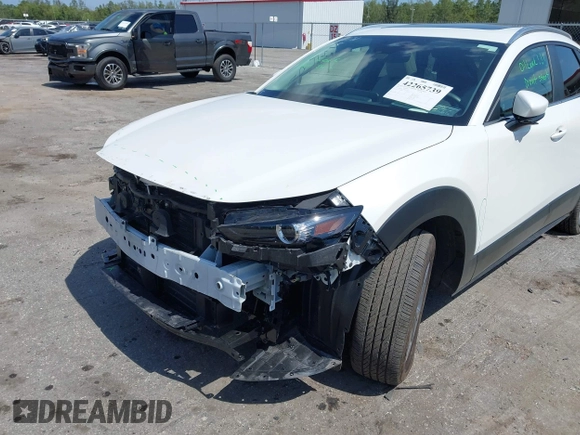 2024 Mazda CX-30 S Carbon Edition with VIN 3MVDMBCM2RM719131, listed as a IAAI auction lot 42265739 with 8,470 mi miles and . Bid and sale history available at DreamBid. Image 6.