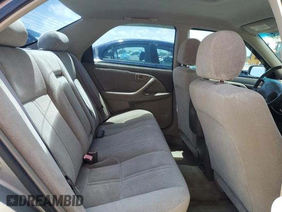 2001 Toyota Camry CE with VIN 4T1BG22K11U106302, listed as a Copart auction lot 55986065 with 151,932 mi miles and Salvage Title. Bid and sale history available at DreamBid. Image 10.