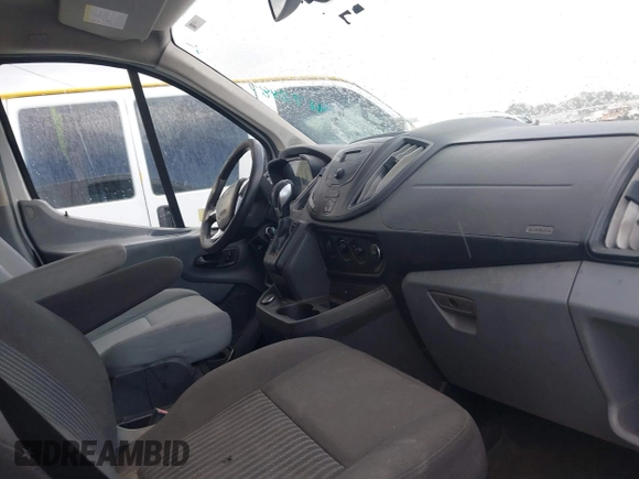 2018 Ford Transit z VIN 1FTYR1ZM6JKA46555, wystawiony jako IAAI lot #42712487 z przebiegiem 212 238 mil mil oraz . Historia ofert i sprzedaży dostępna na DreamBid. Obrazek 5.