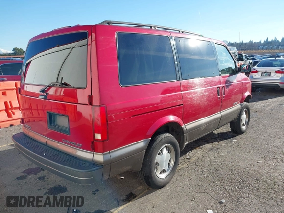 1999 Chevrolet Astro with VIN 1GNEL19W6XB104010, listed as a IAAI auction lot 41403240 with 96,904 mi miles. Bid and sale history available at carsss.com. Image 4.