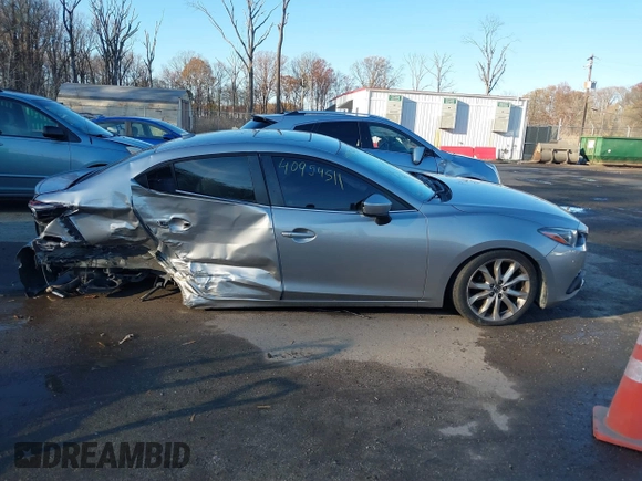 2014 Mazda 3 S Grand Touring with VIN JM1BM1W38E1184450, listed as a IAAI auction lot 40954511 with 157,036 mi miles and . Bid and sale history available at DreamBid. Image 12.