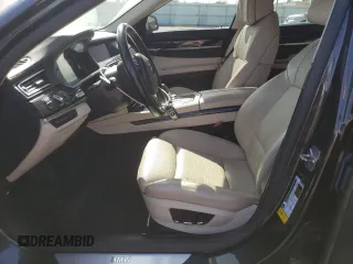 2012 BMW 7 Series 740i with VIN WBAKA4C54CC613419, listed as a Copart auction lot 54420885 with 104,006 mi miles and Salvage Title. Bid and sale history available at carsss.com. Image 7.