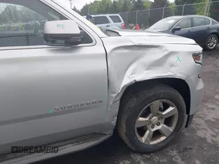 2015 Chevrolet Suburban LT z VIN 1GNSCJKC2FR144528, wystawiony jako IAAI lot #42320028 z przebiegiem 226 076 mil mil oraz . Historia ofert i sprzedaży dostępna na DreamBid. Obrazek 6.
