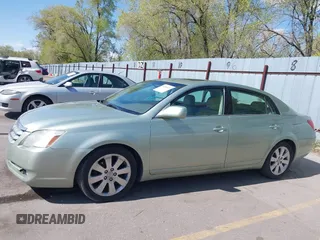 2007 Toyota Avalon XL with VIN 4T1BK36B07U239298, listed as a IAAI auction lot 42046413 with 221,018 mi miles. Bid and sale history available at carsss.com. Image 14.