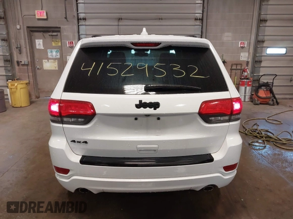 2015 Jeep Grand Cherokee Laredo with VIN 1C4RJFAG4FC660665, listed as a IAAI auction lot 41529532 with 124,099 mi miles. Bid and sale history available at carsss.com. Image 16.