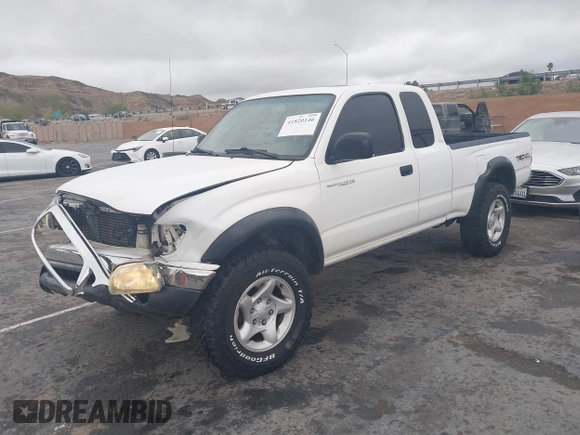 2001 Toyota Tacoma z VIN 5TEWN72N11Z820568, wystawiony jako IAAI lot #41820146 z przebiegiem 188 430 mil mil oraz . Historia ofert i sprzedaży dostępna na DreamBid. Obrazek 16.