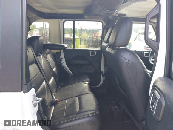 2018 Jeep Wrangler Unlimited Sahara z VIN 1C4HJXEG4JW220092, wystawiony jako IAAI lot #40522478 z przebiegiem 90 529 mil mil oraz . Historia ofert i sprzedaży dostępna na DreamBid. Obrazek 8.