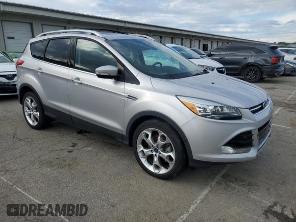 2015 Ford Escape Titanium с VIN 1FMCU9J99FUC33052, выставлен на аукционе Copart как лот 56508365 с пробегом Не указан миль и На запчасти • Non repairable. История ставок и продаж доступна на DreamBid. Изображение 4.