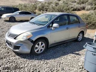 2007 Nissan Versa 1.8 S with VIN 3N1BC11E17L446450, listed as a Copart auction lot 52631415 with 121,006 mi miles and Salvage Title. Bid and sale history available at carsss.com. Image 1.