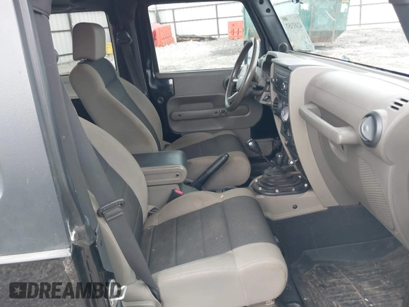 2007 Jeep Wrangler X with VIN 1J4FA24187L179428, listed as a IAAI auction lot 42492457 with 148,208 mi miles and . Bid and sale history available at DreamBid. Image 5.