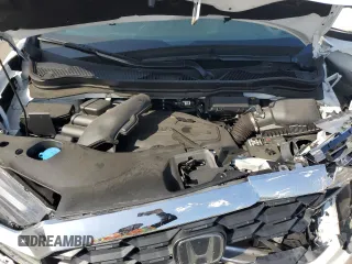 2023 Honda Passport EX-L with VIN 5FNYF8H58PB014241, listed as a Copart auction lot 55176105 with 16,672 mi miles and Salvage title. Bid and sale history available at DreamBid. Image 12.