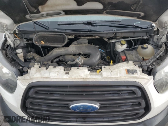 2017 Ford Transit z VIN 1FTYR1ZM5HKB36970, wystawiony jako Copart lot #55703045 z przebiegiem 392 008 mil mil oraz Szkoda całkowita • Salvage title. Historia ofert i sprzedaży dostępna na DreamBid. Obrazek 12.