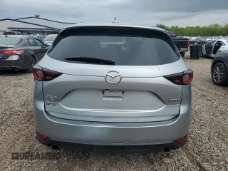 2020 Mazda CX-5 Touring z VIN JM3KFBCM2L0750223, wystawiony jako Copart lot #56300415 z przebiegiem 87 392 mil mil oraz Szkoda całkowita • Salvage title. Historia ofert i sprzedaży dostępna na DreamBid. Obrazek 6.