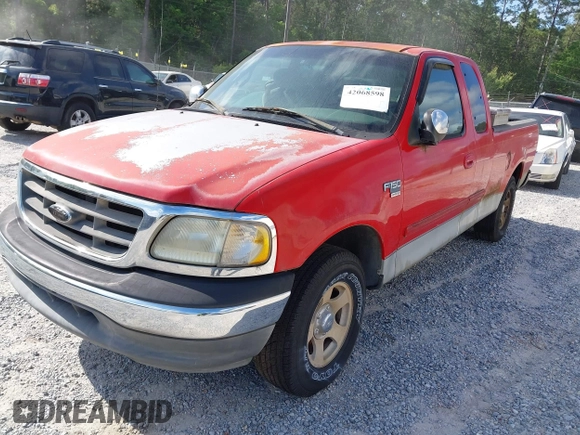 2002 Ford F-150 XL with VIN 1FTRX17W12NA07936, listed as a IAAI auction lot 42068598 with 1 mi miles. Bid and sale history available at carsss.com. Image 2.