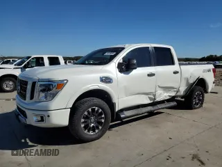 2018 Nissan Titan XD PRO-4X with VIN 1N6BA1F44JN527370, listed as a Copart auction lot 75735564 with 81,272 mi miles and Salvage Title. Bid and sale history available at carsss.com. Image 1.