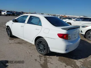 2009 Toyota Corolla with VIN 1NXBU40EX9Z020788, listed as a IAAI auction lot 41760498 with 188,780 mi miles. Bid and sale history available at carsss.com. Image 3.