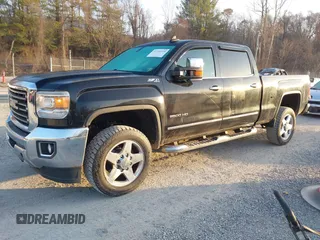 2015 GMC Sierra 2500HD available WiFi SLT with VIN 1GT12ZEG7FF606328, listed as a IAAI auction lot 41793799 with 94,107 mi miles. Bid and sale history available at carsss.com. Image 18.