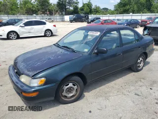 1997 Toyota Corolla with VIN 2T1BA02E4VC176772, listed as a Copart auction lot 60966385 with 167,193 mi miles and Salvage title. Bid and sale history available at DreamBid. Image 1.