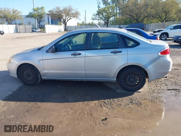 2009 Ford Focus S with VIN 1FAHP34N79W221813, listed as a IAAI auction lot 41758471 with 248,531 mi miles. Bid and sale history available at carsss.com. Image 14.