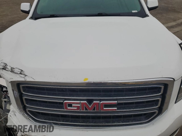 2015 GMC Yukon SLE with VIN 1GKS1AKC8FR733084, listed as a Copart auction lot 82960064 with 163,576 mi miles and Salvage Title. Bid and sale history available at carsss.com. Image 13.