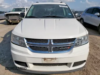 2013 Dodge Journey SE z VIN 3C4PDCAB0DT531874, wystawiony jako Copart lot #59524405 z przebiegiem 125 230 mil mil oraz Czysty tytuł • Clean title. Historia ofert i sprzedaży dostępna na DreamBid. Obrazek 5.