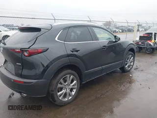2025 Mazda CX-30 S Carbon Edition z VIN 3MVDMBCM9SM783429, wystawiony jako IAAI lot #42065729 z przebiegiem 4 940 mil mil oraz . Historia ofert i sprzedaży dostępna na DreamBid. Obrazek 4.