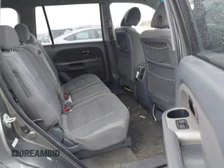 2008 Honda Pilot SE with VIN 5FNYF18398B001764, listed as a IAAI auction lot 41865212 with 355,052 mi miles and . Bid and sale history available at DreamBid. Image 8.