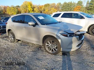 2024 Mazda CX-5 2.5 S Premium Package with VIN JM3KFBDL7R0470375, listed as a IAAI auction lot 40657155 with 8,584 mi miles. Bid and sale history available at carsss.com. Image 1.