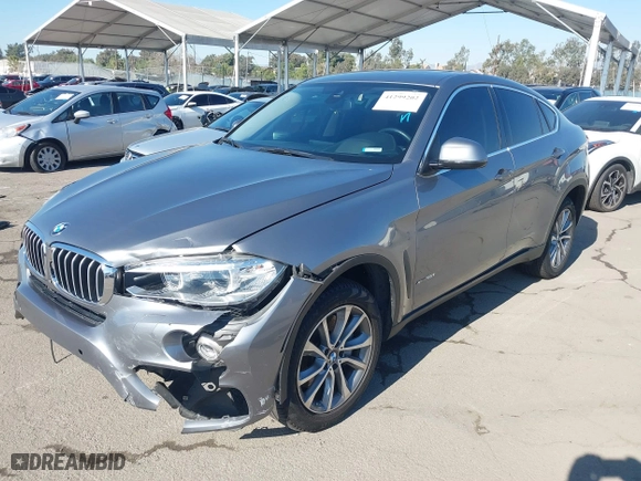2015 BMW X6 xDrive50i with VIN 5UXKU6C52F0F94060, listed as a IAAI auction lot 41299202 with 67,835 mi miles. Bid and sale history available at carsss.com. Image 17.