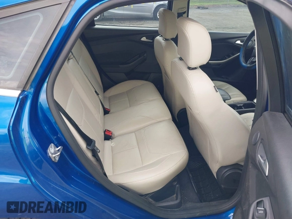 2018 Ford Focus Titanium z VIN 1FADP3N26JL325931, wystawiony jako IAAI lot #42096503 z przebiegiem 106 338 mil mil oraz . Historia ofert i sprzedaży dostępna na DreamBid. Obrazek 8.