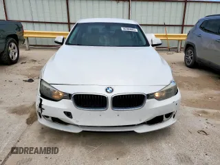 2014 BMW 3 Series 320i z VIN WBA3B1C57EP679989, wystawiony jako Copart lot #56383665 z przebiegiem 125 617 mil mil oraz Szkoda całkowita • Salvage title. Historia ofert i sprzedaży dostępna na DreamBid. Obrazek 5.