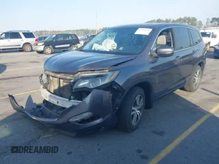 2017 Honda Pilot EX-L with VIN 5FNYF5H58HB011940, listed as a IAAI auction lot 41793151 with 118,088 mi miles. Bid and sale history available at carsss.com. Image 2.