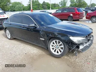 2015 BMW 7 Series 740Li xDrive with VIN WBAYF4C51FD874100, listed as a IAAI auction lot 42583421 with 164,307 mi miles and . Bid and sale history available at DreamBid. Image 1.